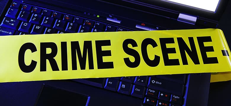 crime scene tape over keyboard