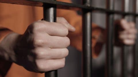 teacher behind bars