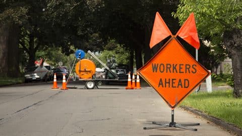 Traffic signs in a construction work zone