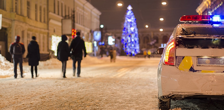 police car on a snowy street