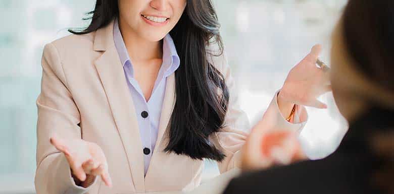 Woman in speaking to lawyer during free consultation